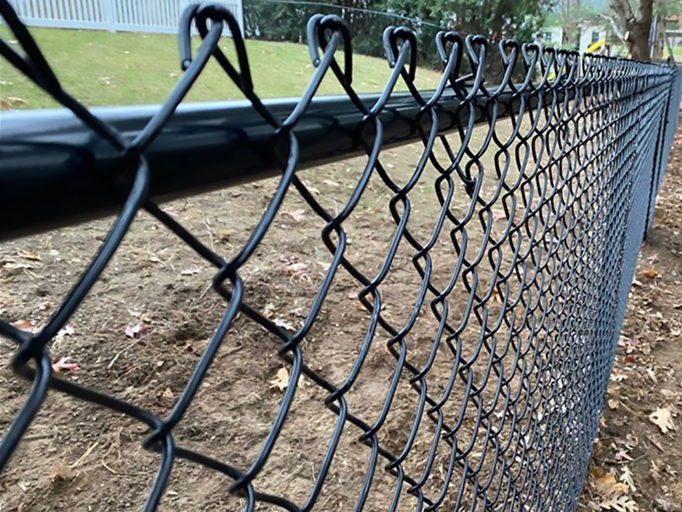 Photo of a PVC coated chain link fence in Derry, New Hampshire