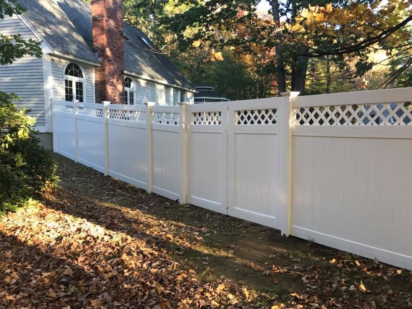Photo of a professionally installed vinyl fence by a New Hampshire fence company.